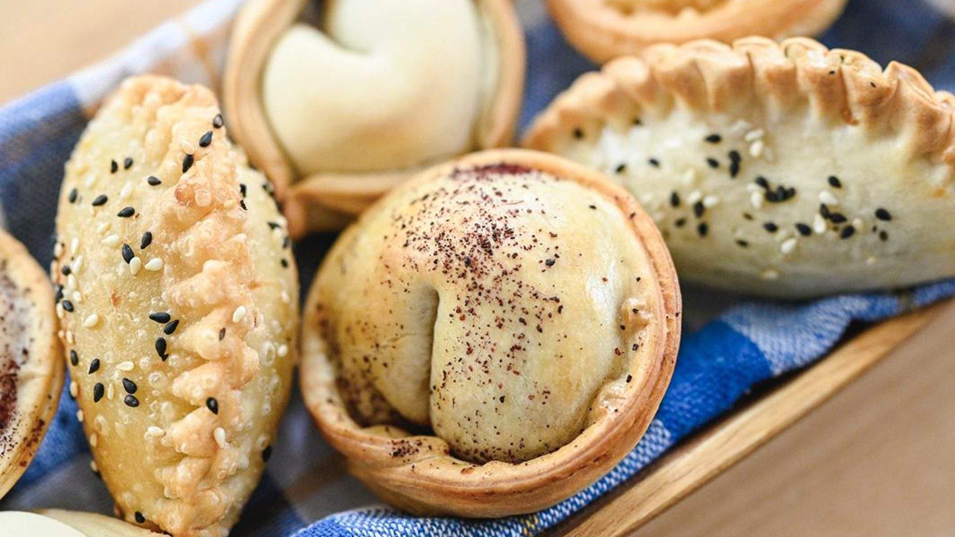 A tray of mixed empanadas