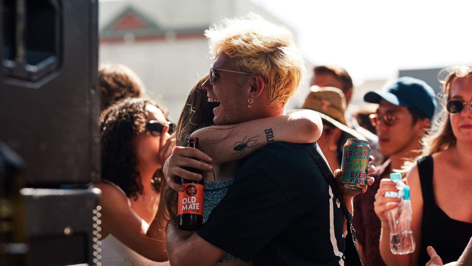 Two festivalgoers hugging