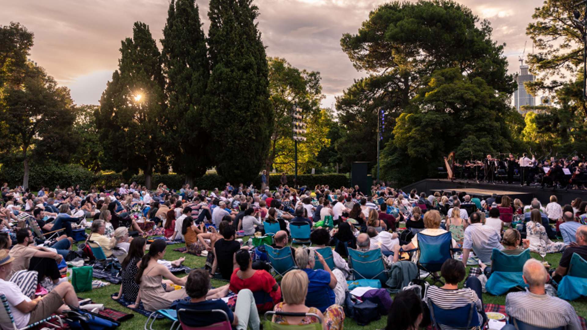 Audience watching Shakespeare Under the Stars