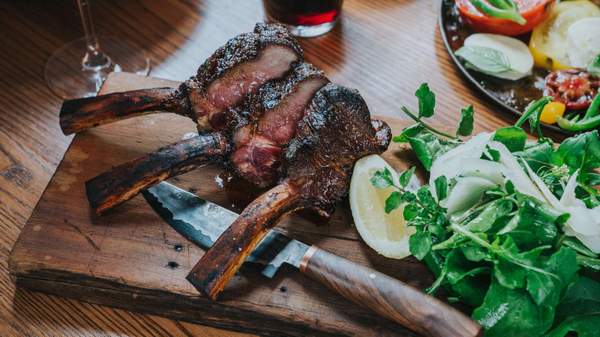 lamb sliced on a wooden board