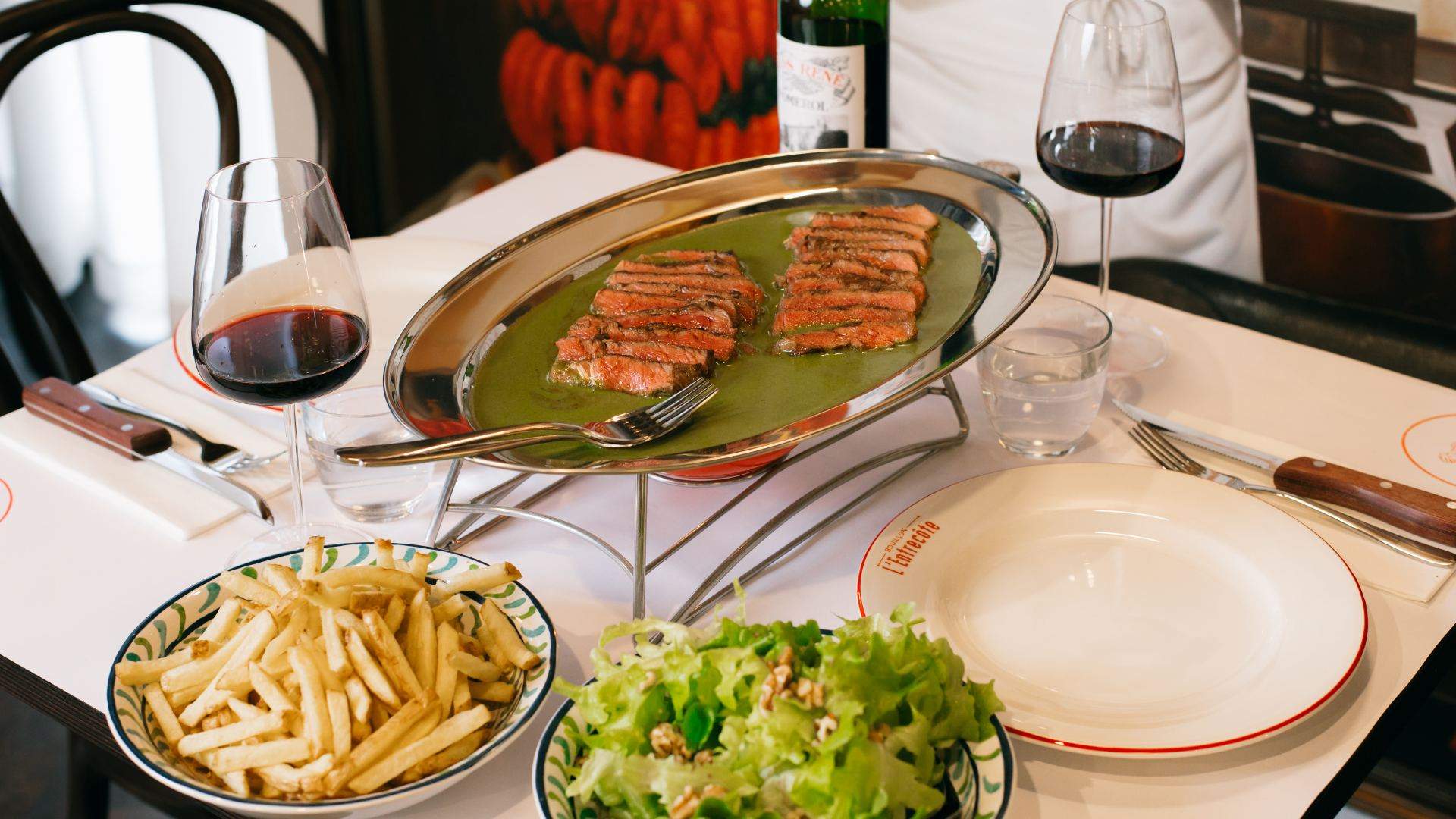 the sirloin steak cooked in a secret green sauce at Bouillon l'entrecote - nearly the best steak in Sydney