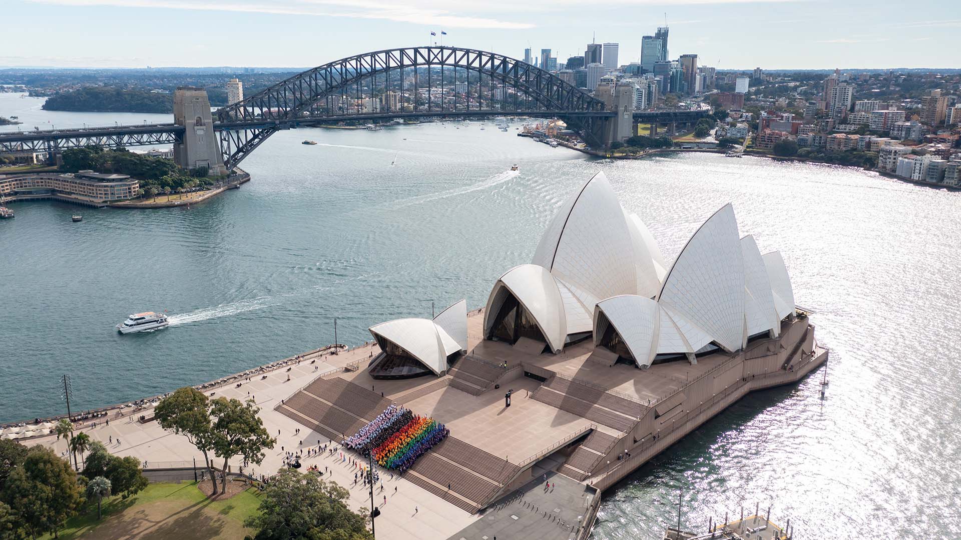 Nearly 1000 Sydneysiders Just Created a Human Progress Pride Flag on the Opera House Steps