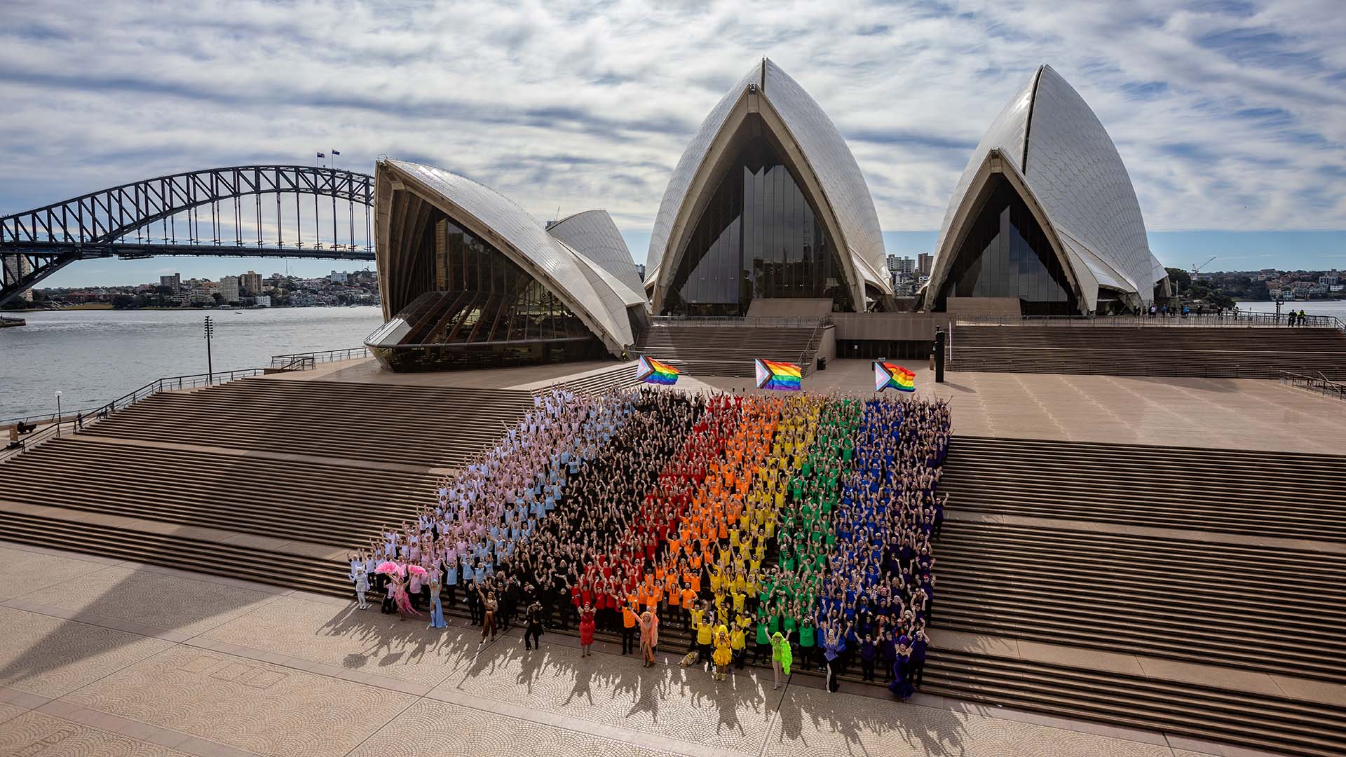 Nearly 1000 Sydneysiders Just Created a Human Progress Pride Flag on the Opera House Steps
