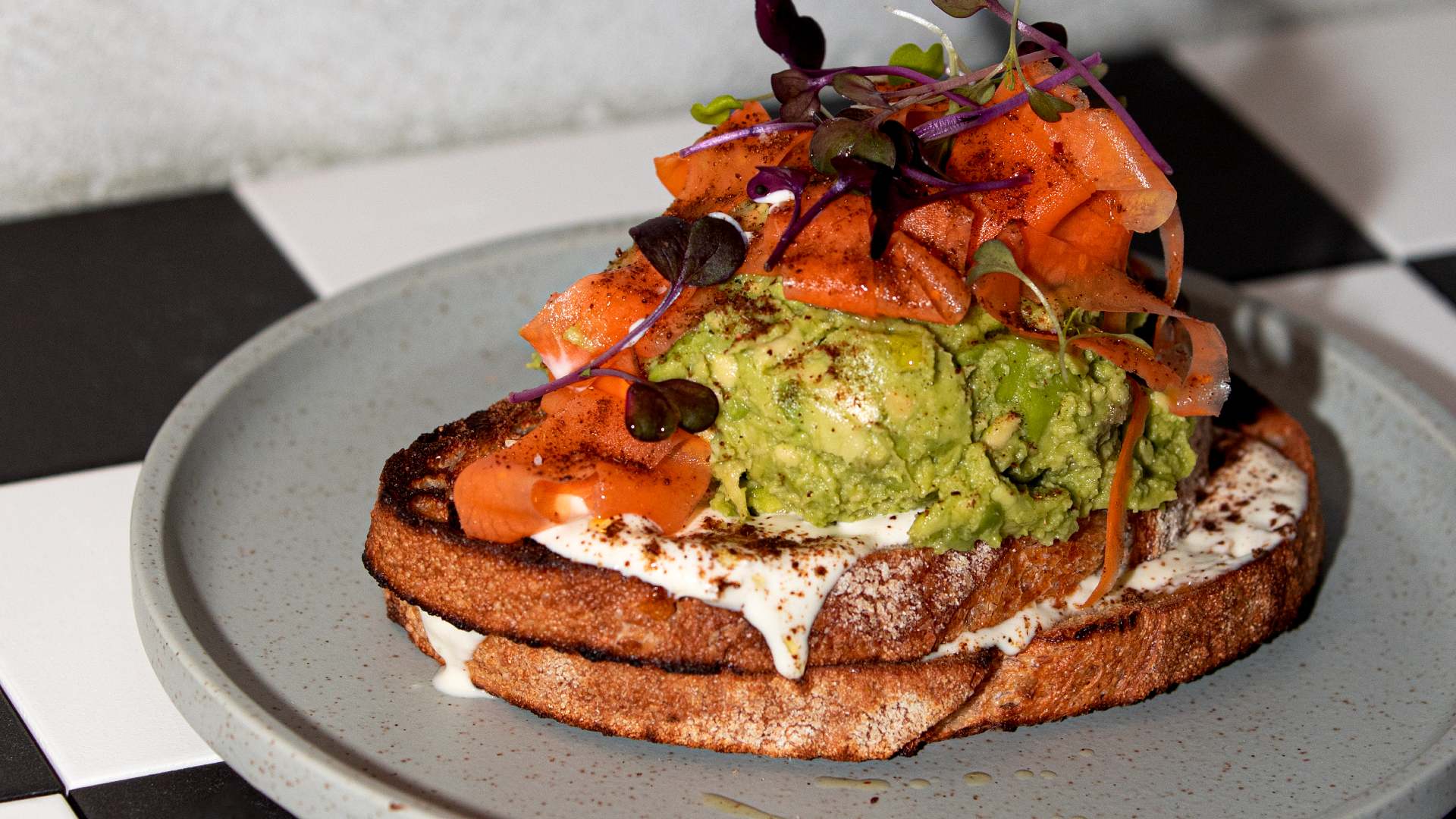 Avocado on toast at Convoy cafe in Moonee Ponds.