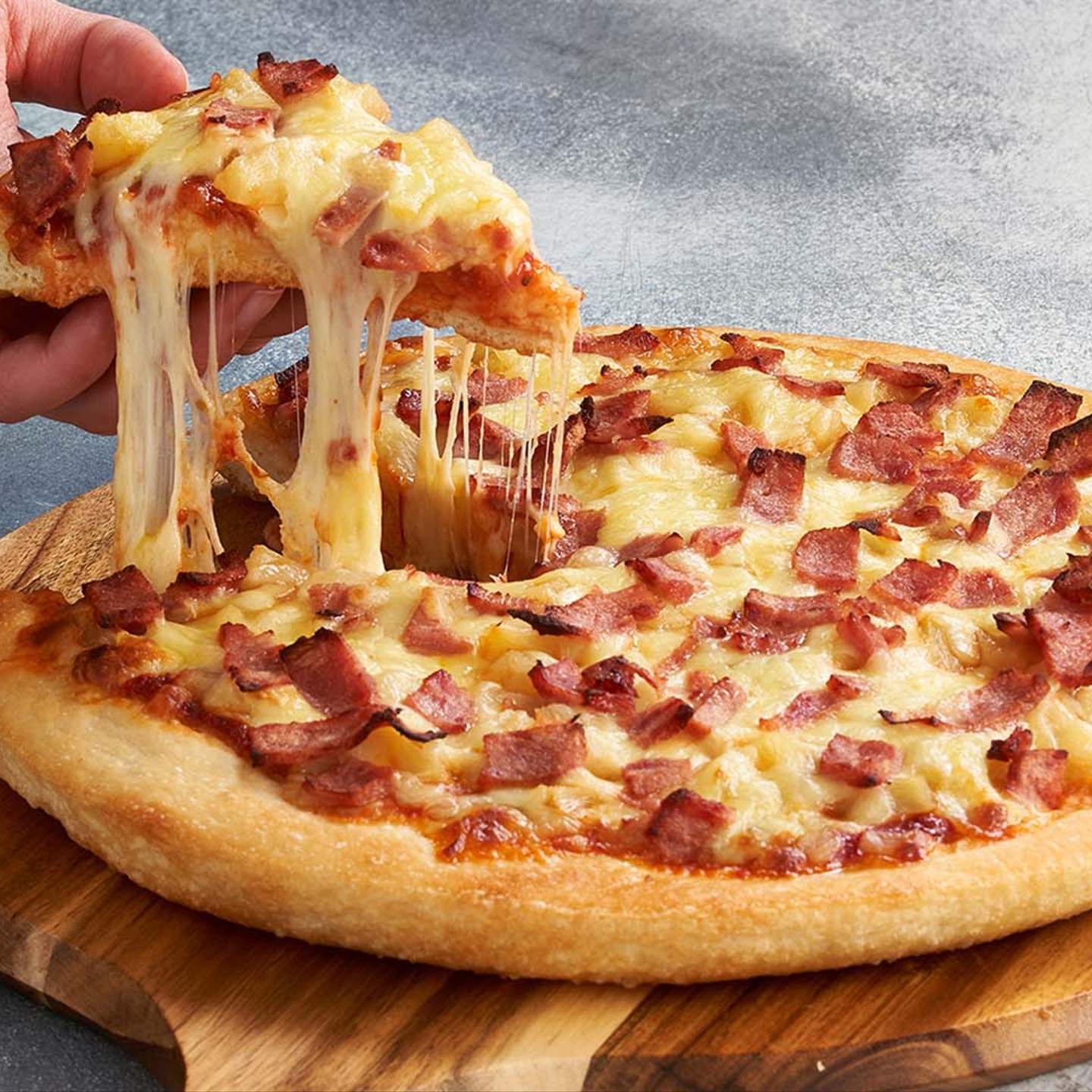 Happy Hawaiian Pizza Day! Celebrate with a delicious Hawaiian