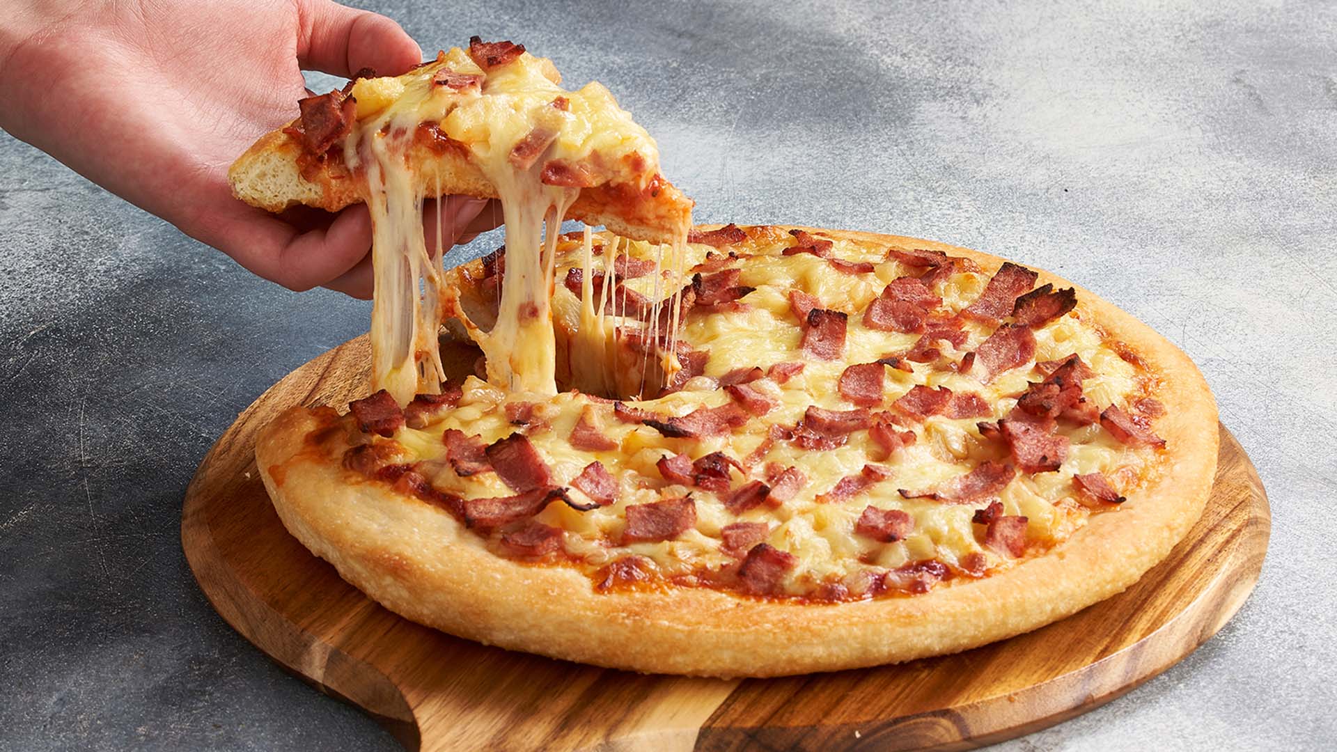 Pizza Hut Is Giving Away 35,000 Free Pizzas in August to Celebrate 60 Years of Hawaiian Slices