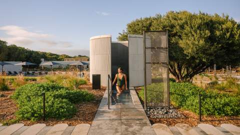 Someone walking out of a shower at Alba Thermal Spa - the best day spa in Melbourne