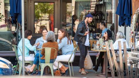 a few tables of people drinking at marion on gertrude street - one of the best bars in Melbourne.