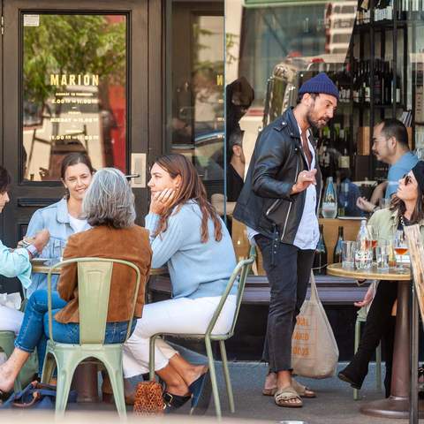 a few tables of people drinking at marion on gertrude street - one of the best bars in Melbourne.