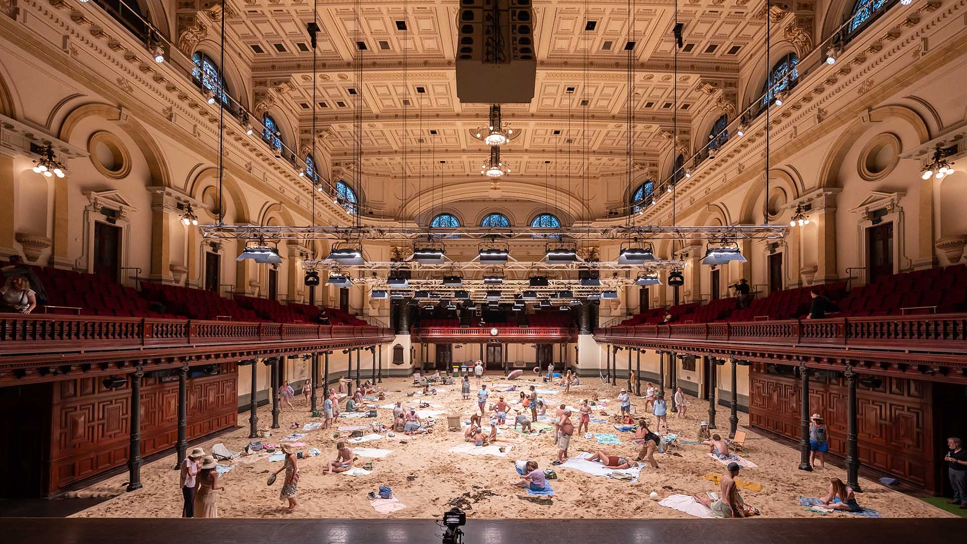 Sydney Town Hall Has Temporarily Turned Into an Indoor Beach Complete with 26 Tonnes of Sand