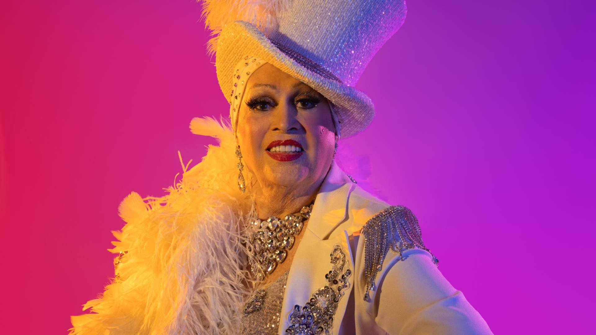 "Wear Something You're Comfortable In": Trans Icon Carlotta Gives Her Mardi Gras Style Tips