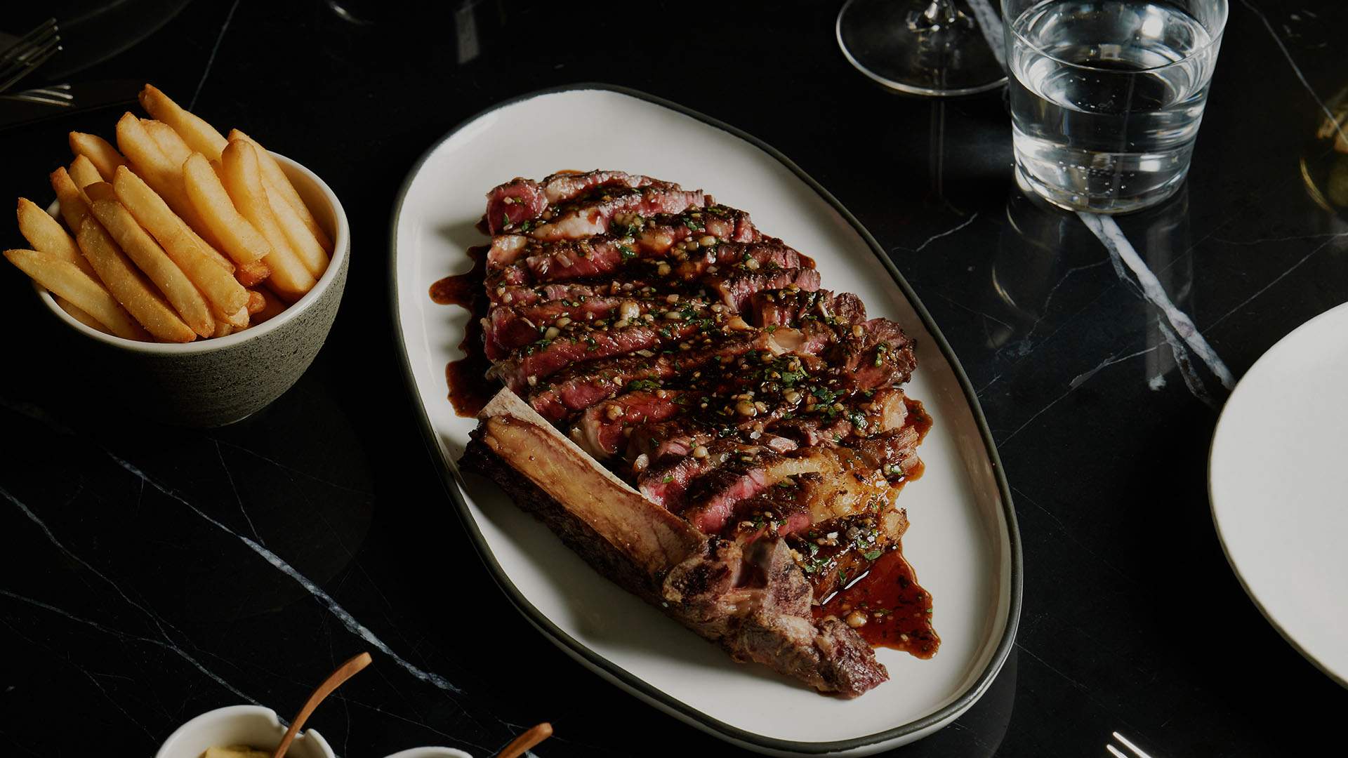 a large sliced steak at Brasserie 1930 - home to one of the best steaks in sydney