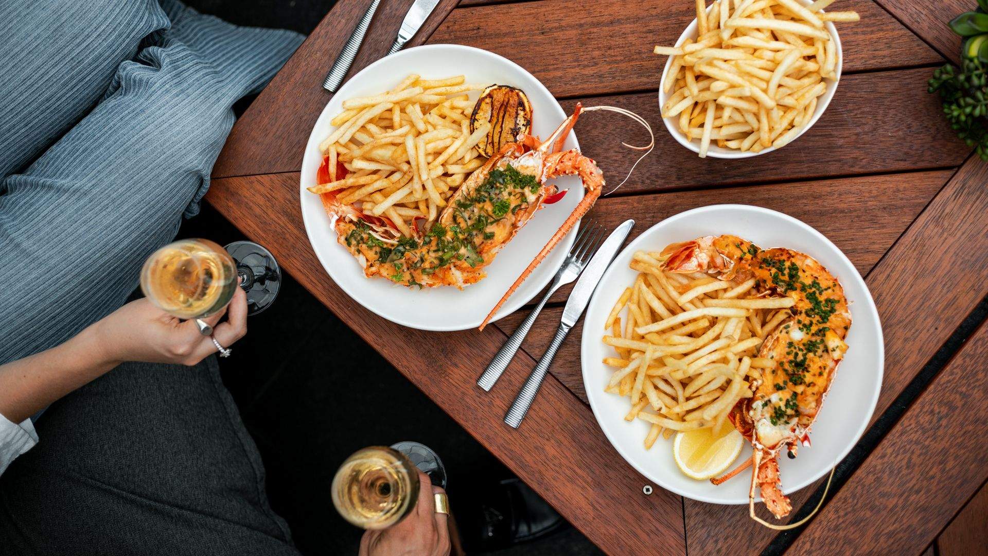 plates of lobsters and fries at Botswana Butchery - sydney