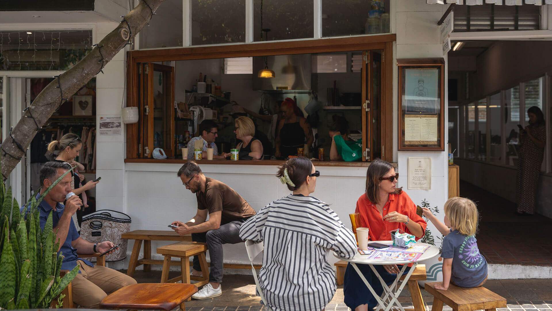 People sitting outside having brunch at Queen Ester in Newport - one of the best cafes in Sydney