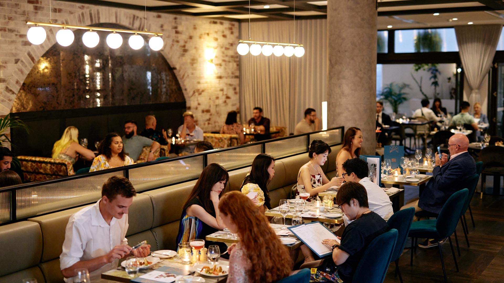 Bisou Bisou Has Relaunched as a Casual French Brasserie Heroing Mussels and Rotisserie Chicken