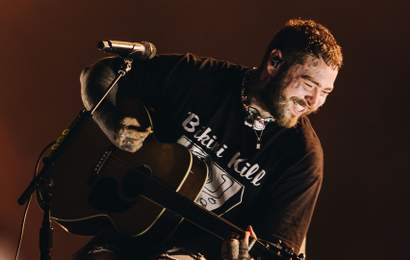 Background image for Post Malone Is Bringing His World Tour to Australia in 2023 — and He Might Be Popping Up at a Certain Festival Too