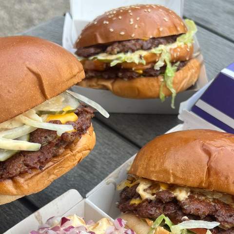 Three smash burgers from Chebbos Burgers food truck — home to some of the best burgers in Sydney.