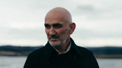 Portrait photo of Paul Kelly.