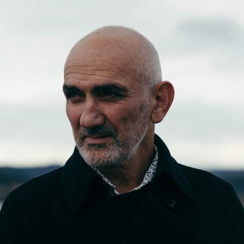 Portrait photo of Paul Kelly.