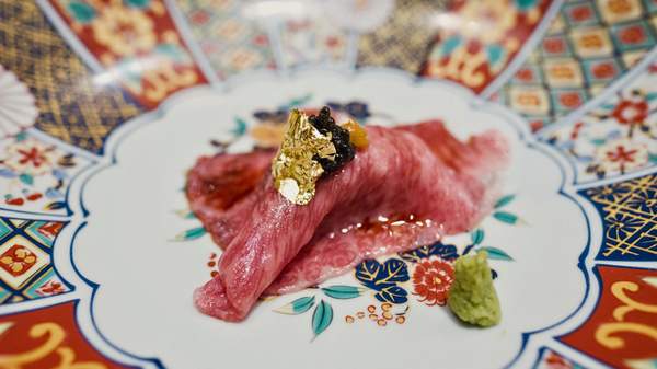 Raw wagyu beef with wasabi and gold leaf at TAKASHIYA in Brisbane