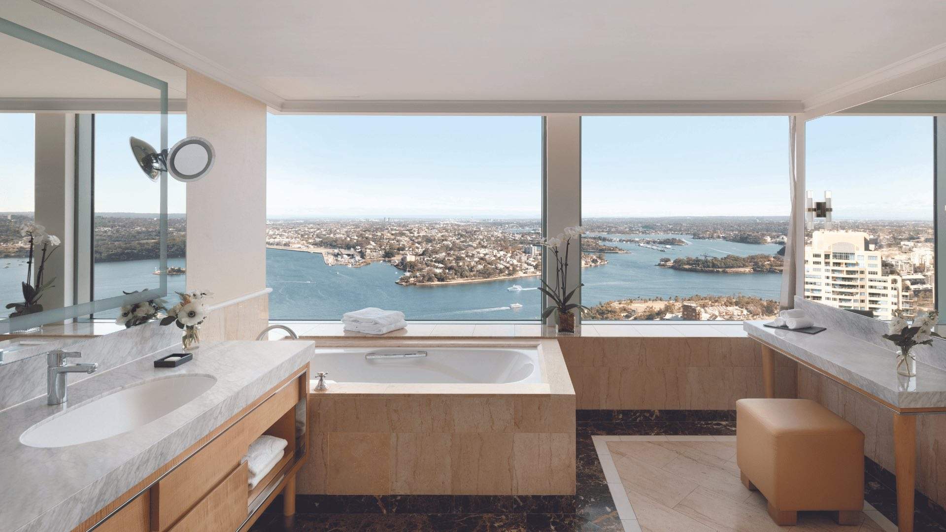 A bathroom with a view of Sydney Harbour at the Shangri-La Hotel.
