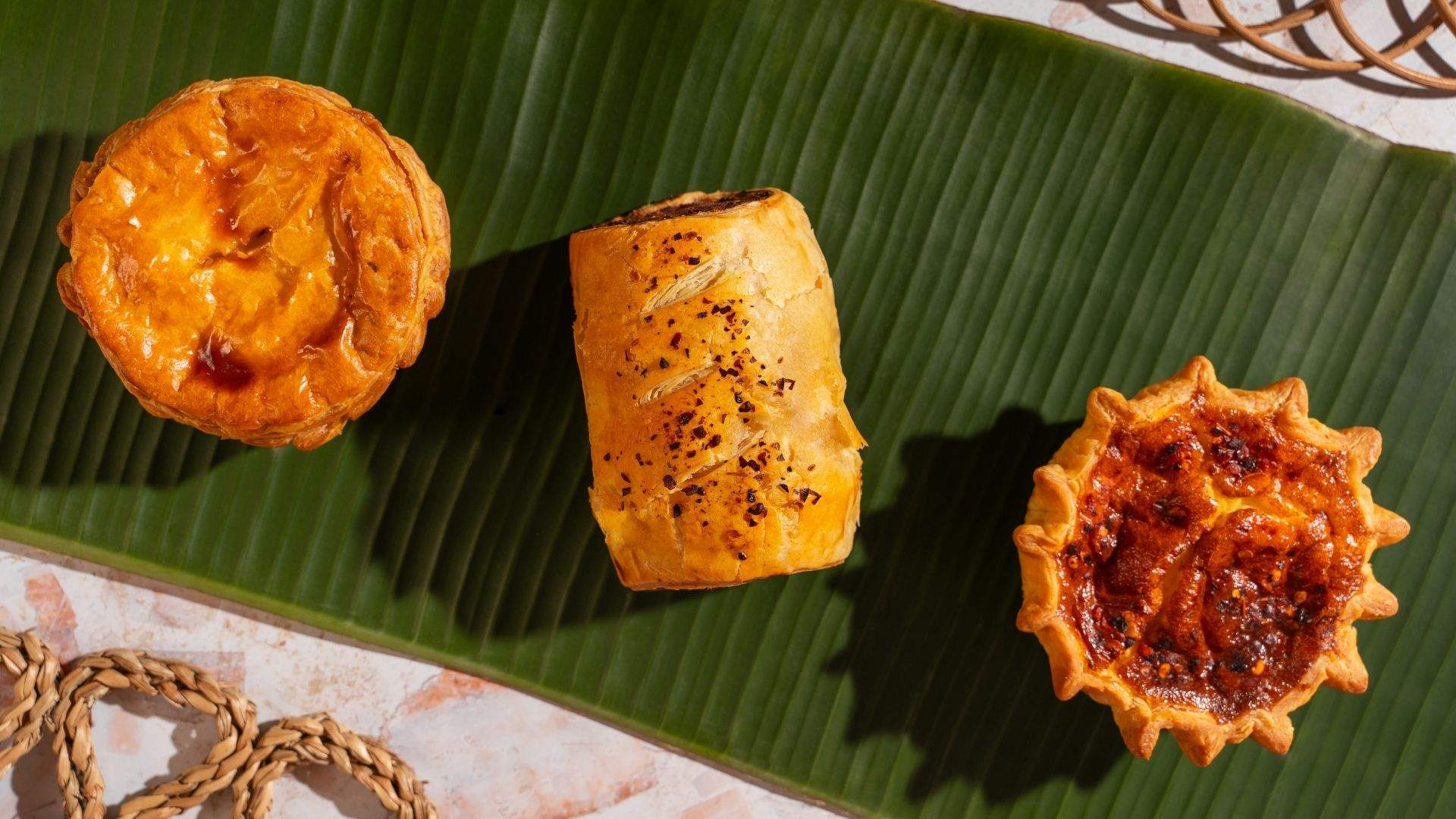 Chat Thai x Tokyo Lamington collab savoury treats — quiche, sausage roll and pie. 
