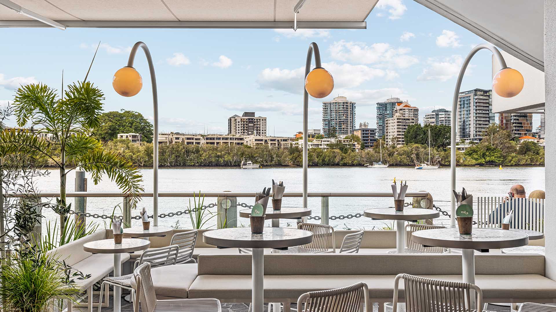 Eagle Street's Riverfront Greek Eatery Opa Has Given Its Scenic Bar a Santorini-Inspired Makeover
