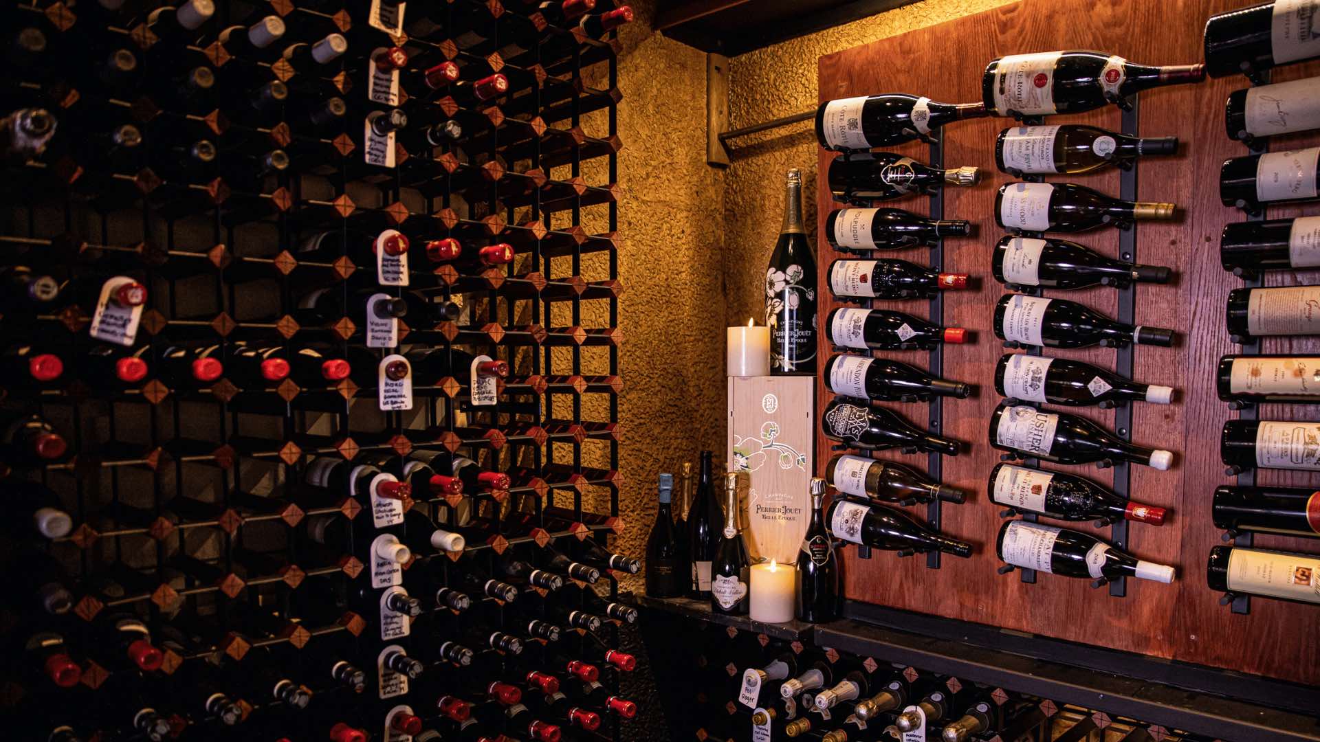 Photo of wine bottles in the wine cellar at Parlour.