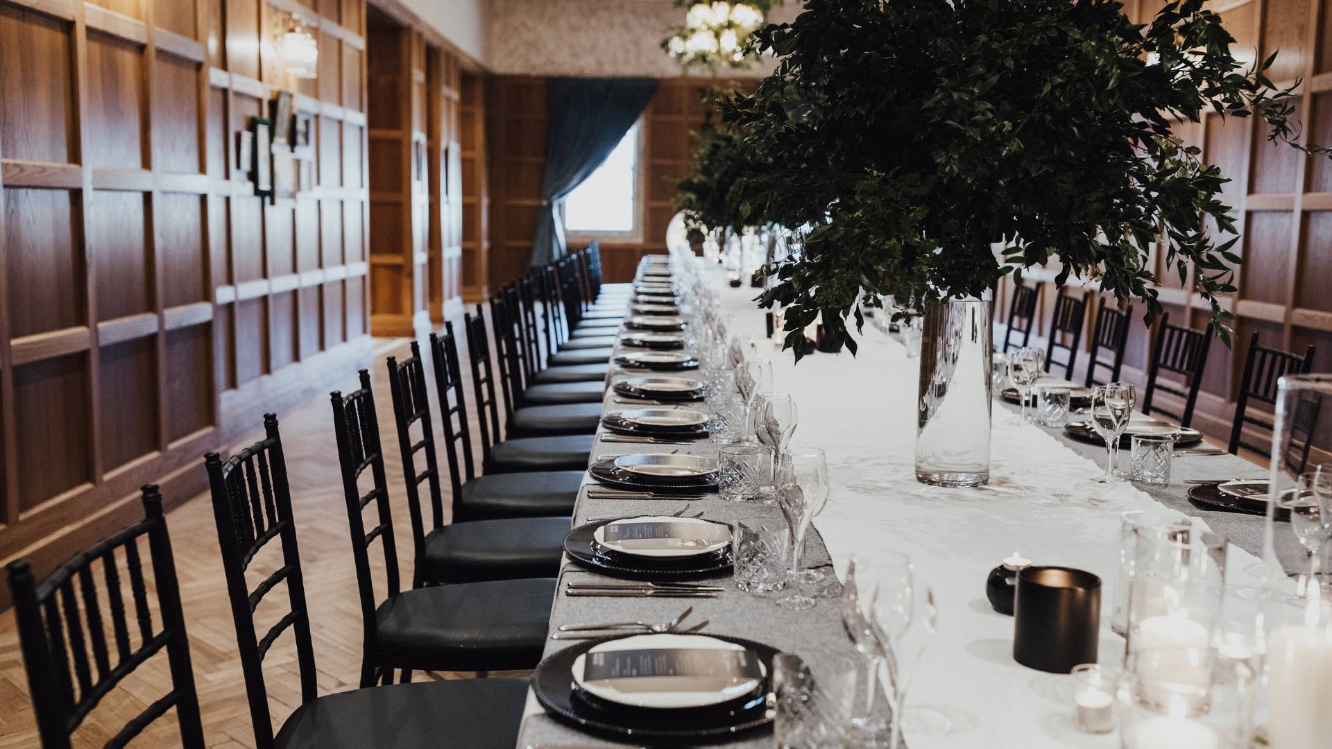 A photo of a long table set up in Cloudland's Heritage Room.
