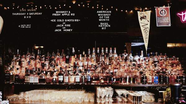 A photo of the back bar stocked with whisky at Jolene's Sydney.