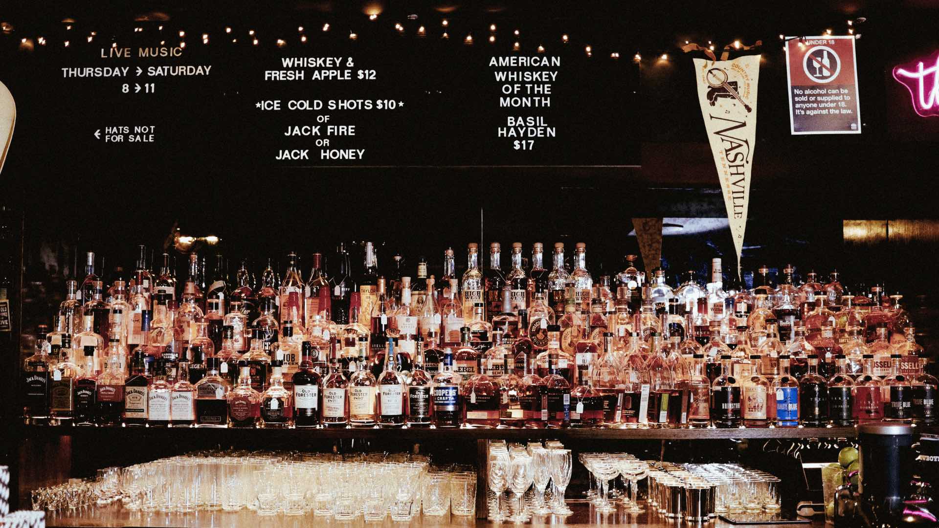 A photo of the back bar stocked with whisky at Jolene's Sydney.