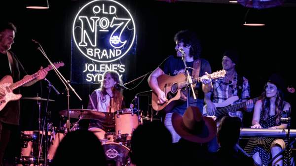 A photo of a band performing at Jolene's Sydney.
