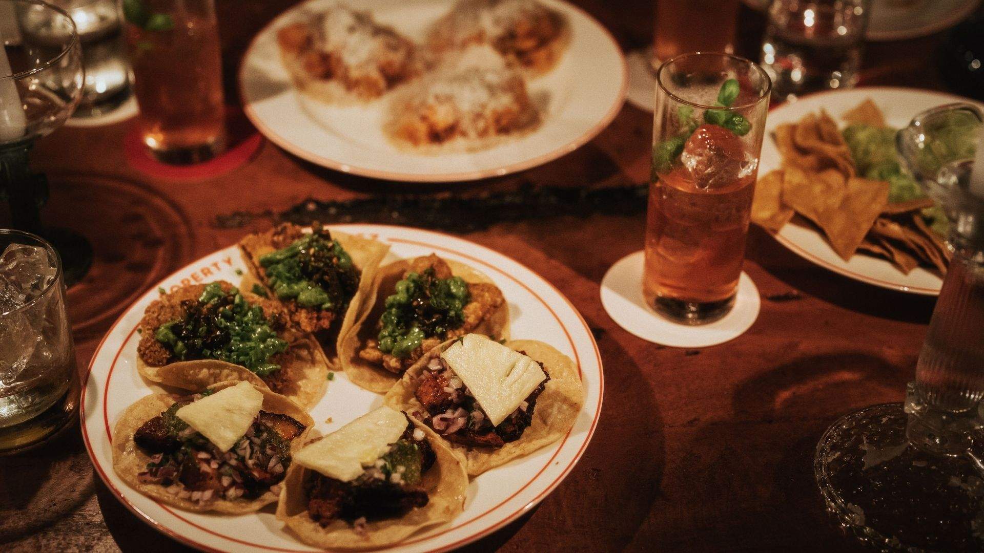 Bites (tacos) from the El Primo Sanchez menu and exclusive cocktails available at its hidden speakeasy, La Prima.