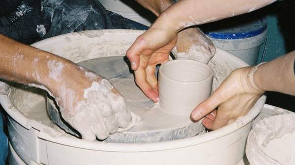 Wheel throwing at Pot Dispensary pottery studio in Melbourne.