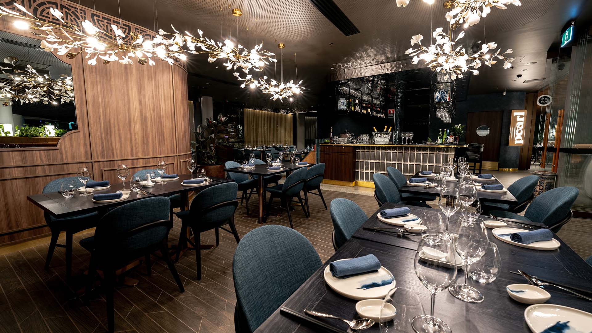 The luxurious dining room with speckled light fixtures at Circular Quay's Pearl