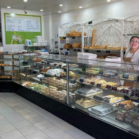 Interiors of Belmore Continental bakery, featuring a cameo by beloved bakery owner, Tina. 