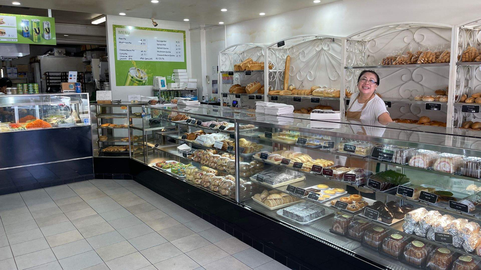 Interiors of Belmore Continental bakery, featuring a cameo by beloved bakery owner, Tina. 