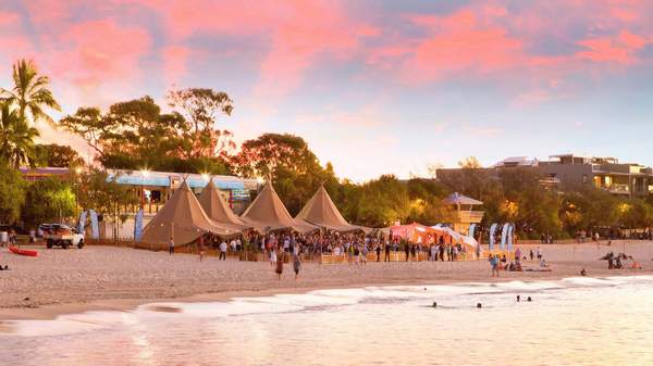 The Noosa Eat and Drink Festival on the beach at sunset.