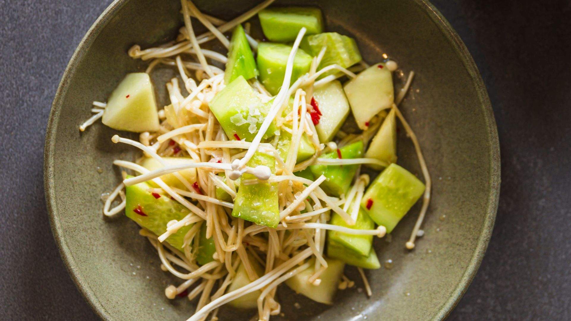Cucumber, piel de sapo & enoki salad with hot & sour dressing & rice noodles from Mitch Orr's monthly menu takeover for November 2023 at Two Good Co Cafe.