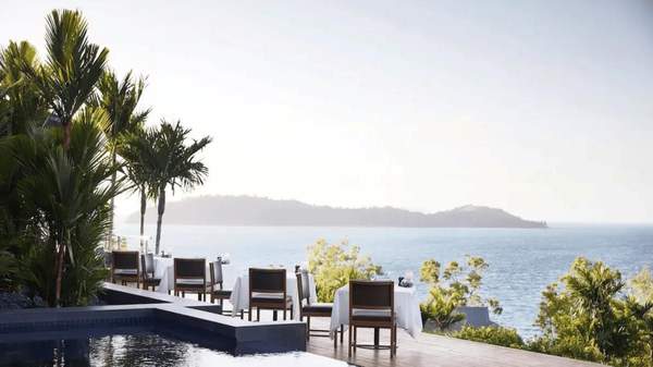 Dining tables overlooking the ocean at qualia resort on Hamilton Island.