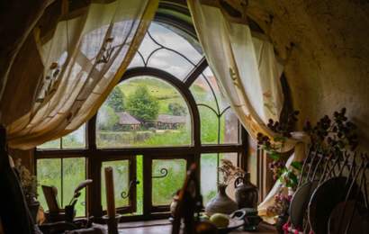 Background image for The Hobbiton Movie Set Has Opened Its Hobbit Holes to the Public So You Can Step Inside Bagshot Row
