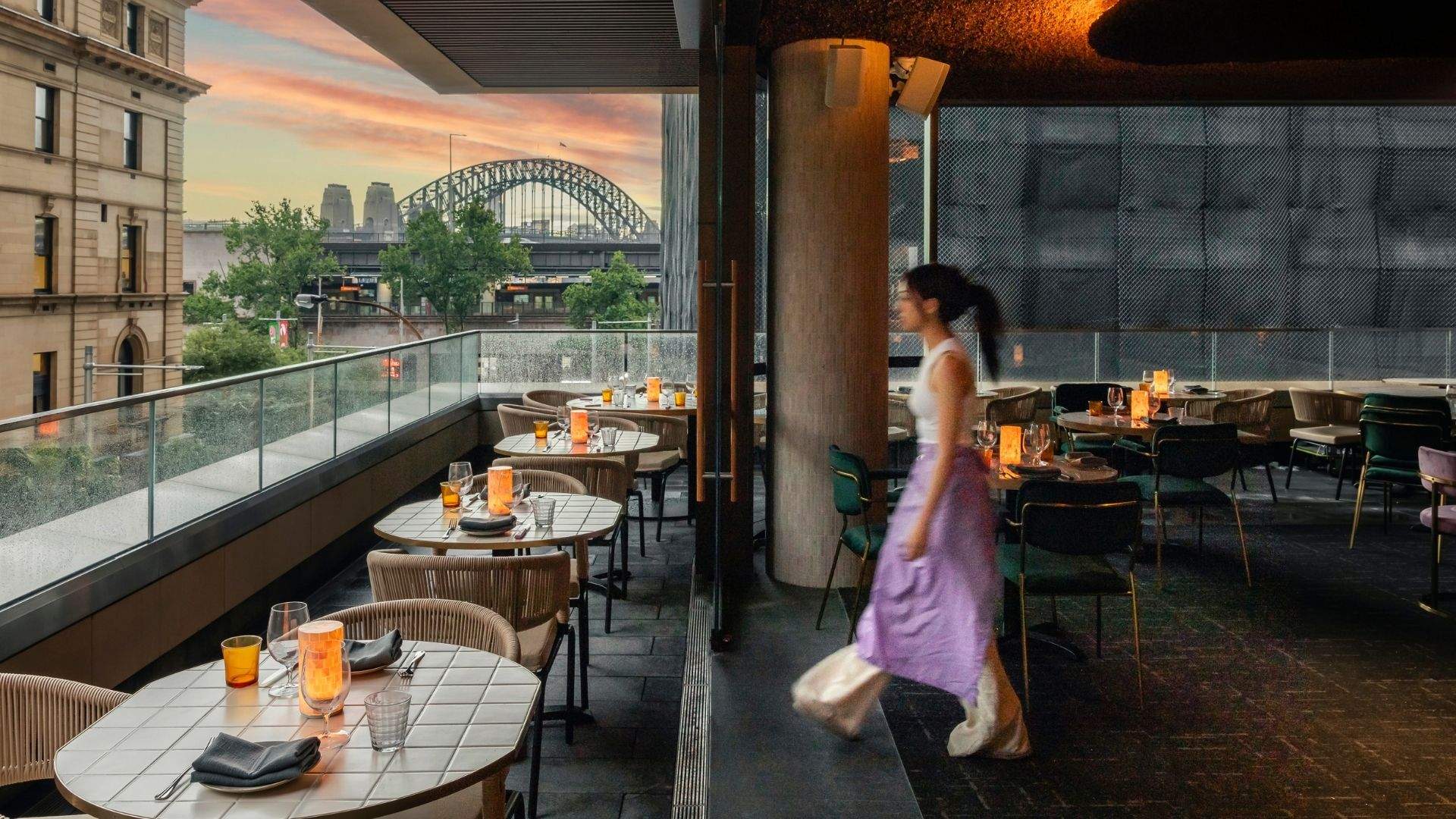 Interior shot showcasing the stunning Harbour Bridge view from Penelope's in Quay Quarter Tower.