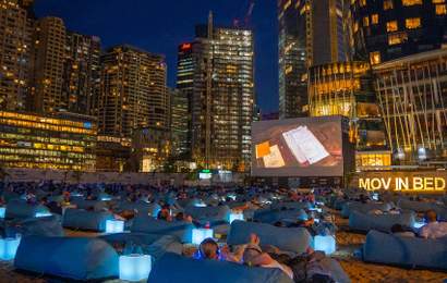 Background image for Movies on Mattresses Are Back: Mov'In Bed's Barangaroo Beach Cinema Is Returning for Summer 2024-25