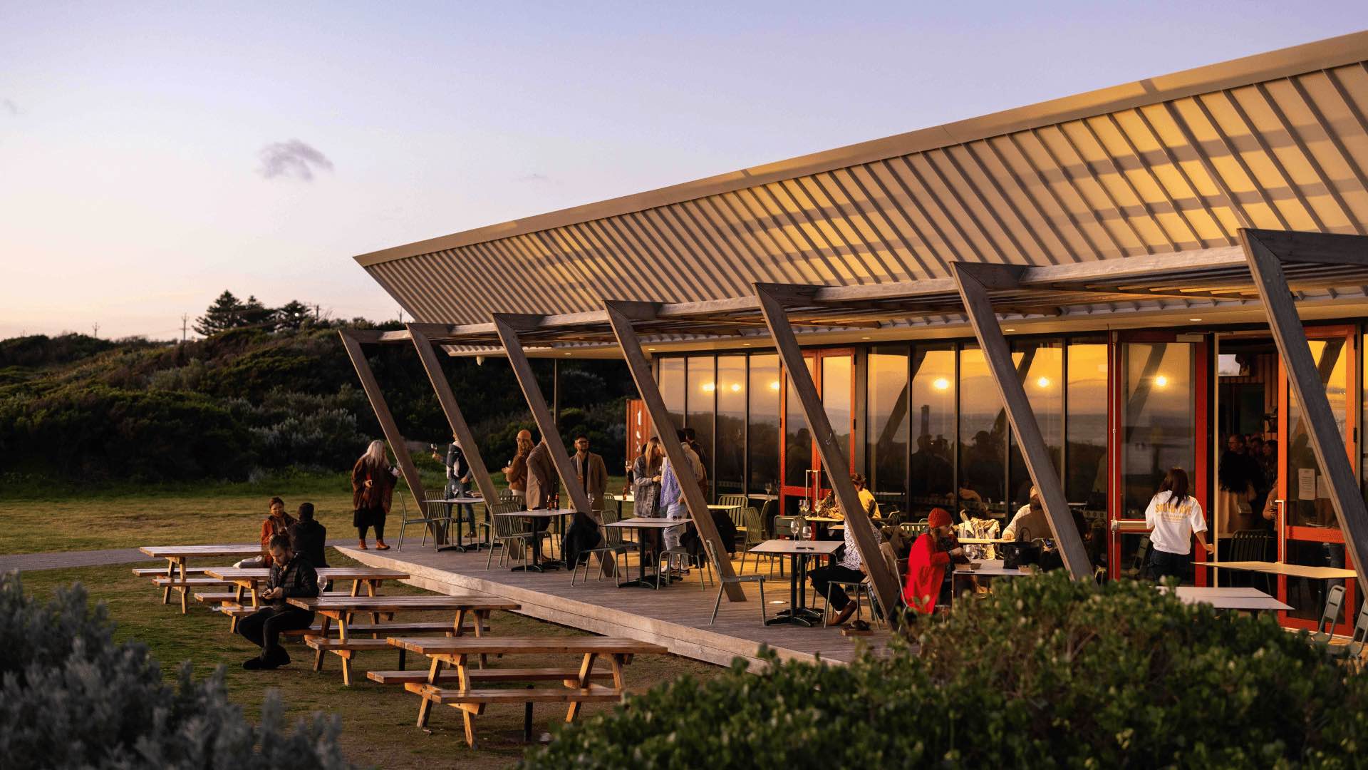 An exterior shot of the Silver Sands Beach Club at sunset.