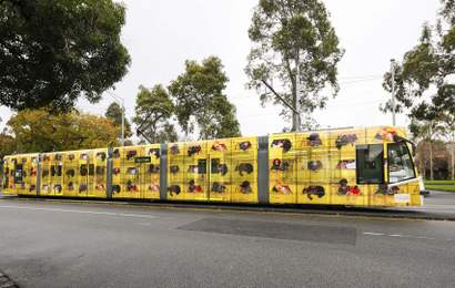 Background image for You Can Now Get Around Melbourne on 2024's Stunning Fleet of First Peoples-Designed Art Trams