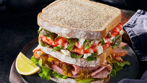 Close up of a surf and turf sandwich made with Abbott's Bakery bread