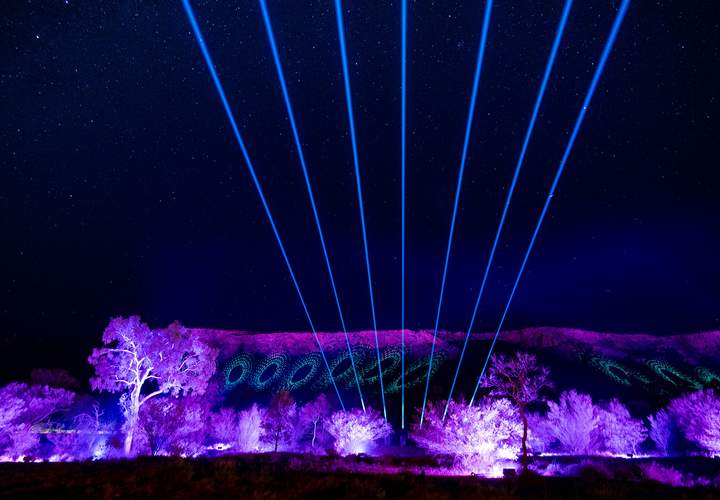 Background image for Getting the MacDonnell Ranges Glowing Is Just the Beginning of 2025's Packed 'Parrtjima — A Festival in Light' Program