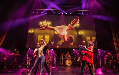 Background image for If 'Dirty Dancing' Is the One 80s Movie That You Can't Get Enough of, You'll Want to See It in Concert in 2025