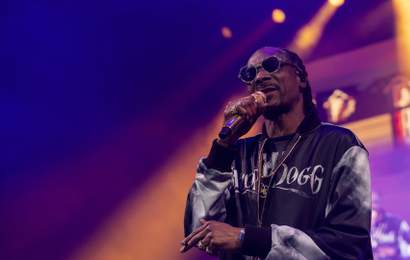 Background image for Drop It Like It's Hot: Snoop Dogg Is Headlining the 2025 AFL Grand Final Entertainment Lineup