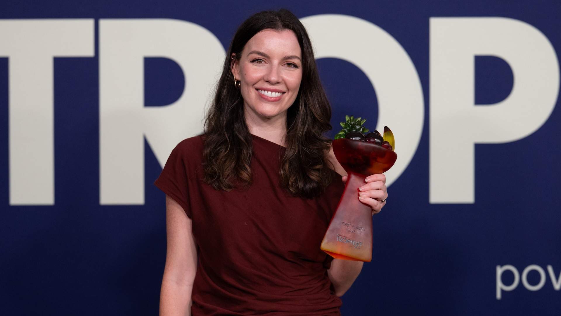 SYDNEY, AUSTRALIA - FEBRUARY 22: Lianne Mackessy poses for a photo with the Tropfest 2026 First Prize trophy for her film Cresendo during Tropfest 2026 at Centennial Park on February 22, 2026 in Sydney, Australia. (Photo by Wendell Teodoro/Getty Images)